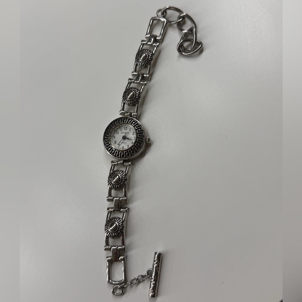 Sunrise quartz Japan movement silver toned watch needs battery